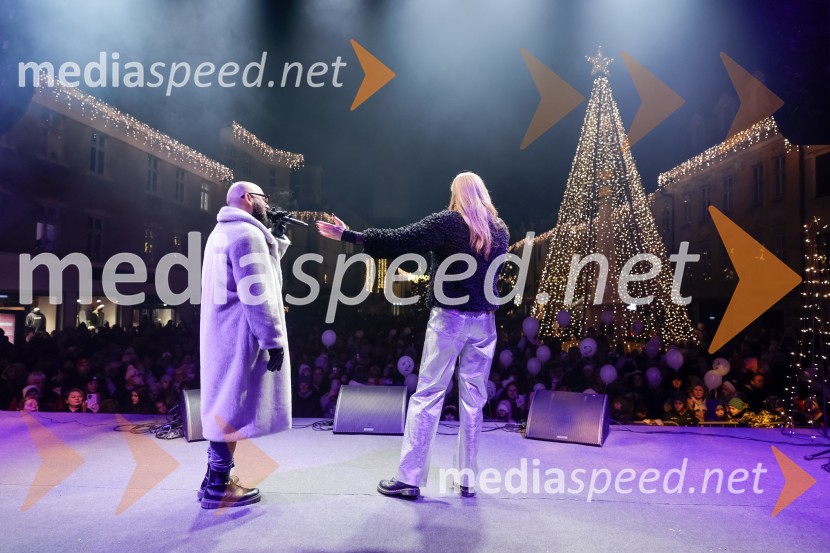  Tilen Lotrič, pevec;  Manca  Špik, pevkaTradicionalni prižig prazničnih luči na občinski praznik MOK