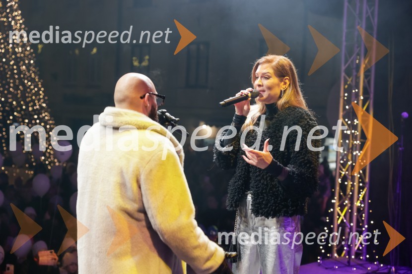  Tilen Lotrič, pevec;  Manca  Špik, pevkaTradicionalni prižig prazničnih luči na občinski praznik MOK