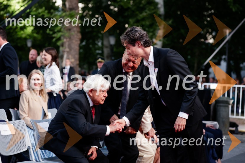  Milan Kučan, nekdanji predsednik Republike Slovenije;  Luka Mesec, podpredsednik vlade in minister za delo, družino, socialne zadeve in enake možnostiOsrednja slovesnost ob 34. dnevu državnosti na Kongresnem trgu