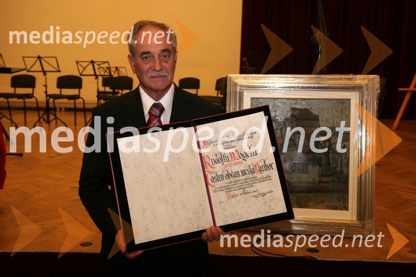 Rudi Moge, nekdanji poslanec DZ in predsednik sveta SNG Maribor ter prejemnik priznanja častni občanPodelitev priznanj Mestne občine Maribor za leto 2009 in razglasitev častnega občana