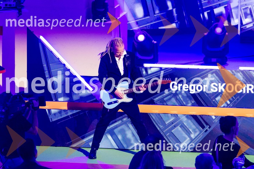 Dobrodelni večer OKS-ja z odbojkarjem Tinetom Urnautom