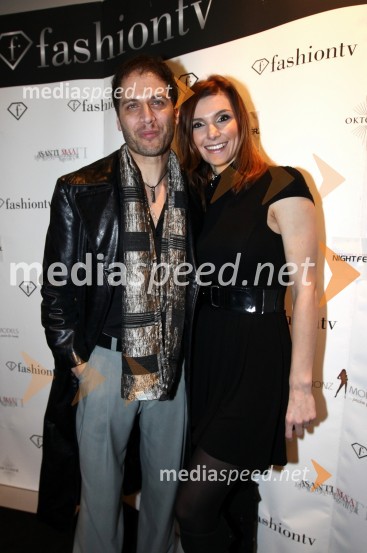 Joe Rain, lastnik modne agencije Bronz in Brigita Novak, direktorica podjetja AsantiFashion TV, prednovoletna zabava