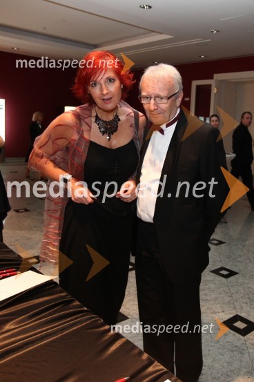 Darinka Pavlič Kamien, vodja službe za odnose z javnostmi pri Telekomu Slovenija in predsednica Lions kluba Ljubljana in soprog Peter Kamine
 
21. Veliki Rotarijski ples