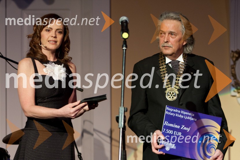 	Tajda Lekše, voditeljica prireditve in Vladimir Pezdirc, predsednik Rotary kluba Ljubljana21. Veliki Rotarijski ples