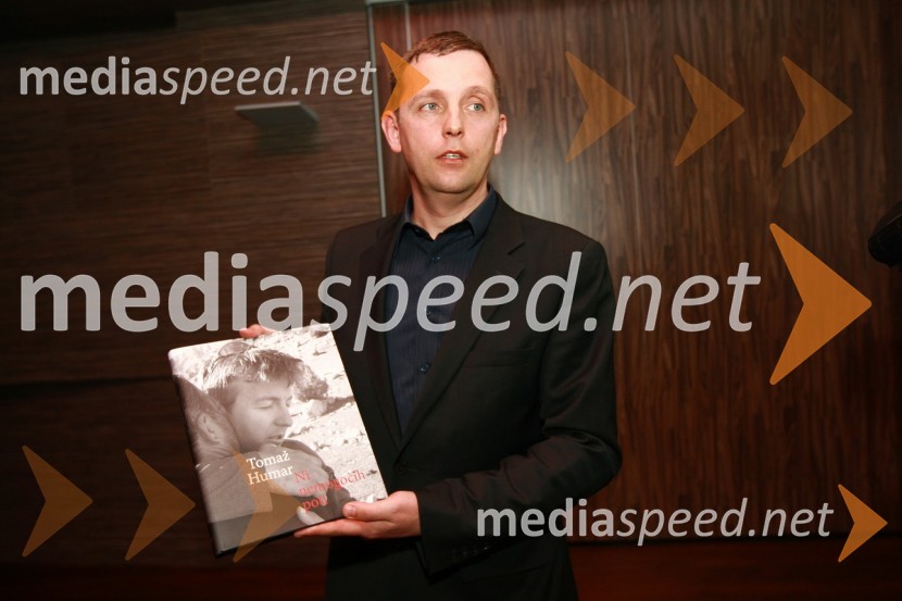 Marjan Humar, brat Tomaža HumarjaTomaž Humar: Ni nemogočih poti, novinarska konferenca ob drugi dopolnjeni izdaji