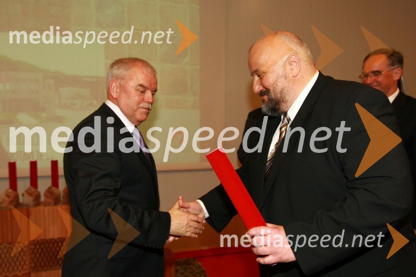 Branko Selak, predsednik Združenja za gradbeništvo pri GZS in predsednik upravnega odbora podjetja Marmor Hotavlje Holding d.o.o. ter Igor Janežič, predsednik uprave Gradbeni inštitut ZRMK d.o.o.23. mednarodni sejem gradbeništva in gradbenih materialov MEGRA 2010, slovesna otvoritev