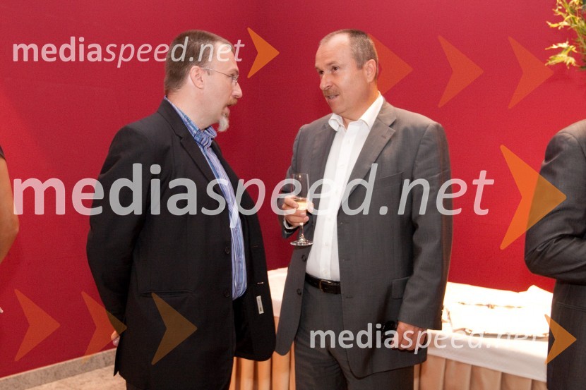 Borut Omerzel, urednik slovenske izdaje revije Playboy in Milan Pešič, direktor podjetja Slovenska knjiga d.o.o.Ura leta 2010