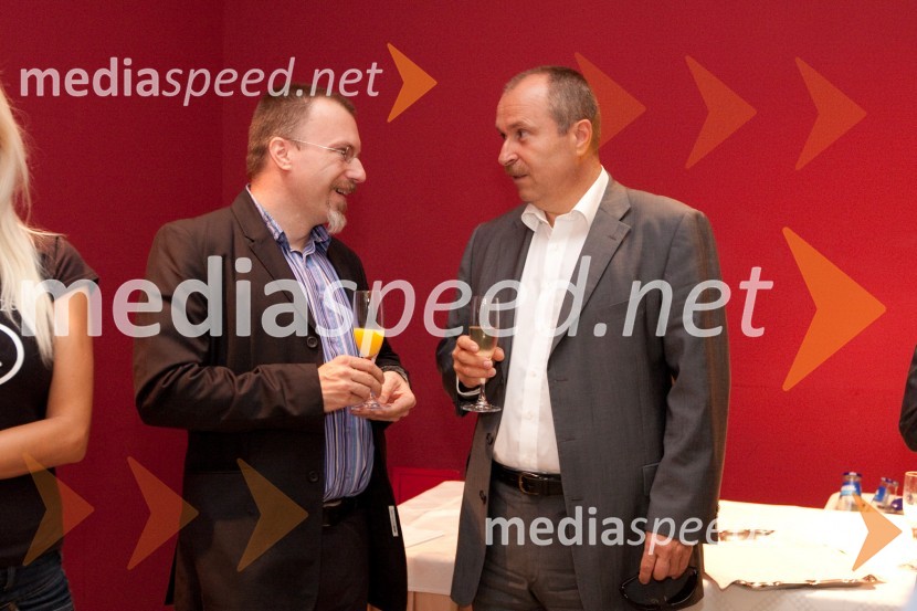 Borut Omerzel, urednik slovenske izdaje revije Playboy in Milan Pešič, direktor podjetja Slovenska knjiga d.o.o.Ura leta 2010