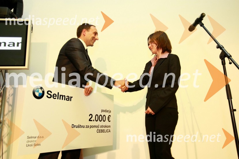 Uroš Seles, direktor BMW Selmar d.o.o. in Nataša Rojko, Društvo za pomoč otrokom Čebelica
Odprtje najsodobnejšega BMW salona Selmar Maribor