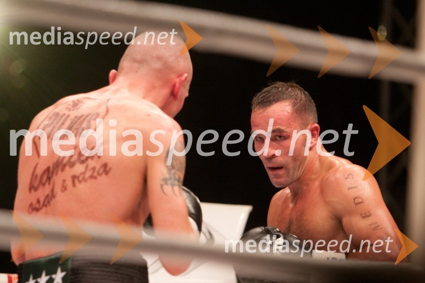 Rafal Jackiewicz, izzivalec Dejana Zavca in Dejan Zavec, svetovni prvak v velterski kategoriji po verziji IBF inDejan Zavec in Rafal Jackiewicz, dvoboj za ubranitev naslova svetovnega IBF prvaka