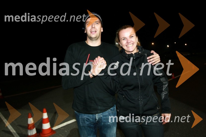 Tomaž Kaučič, voznik rallyja in Mina KravanjaPorsche Slovenija, Poslovni poligon