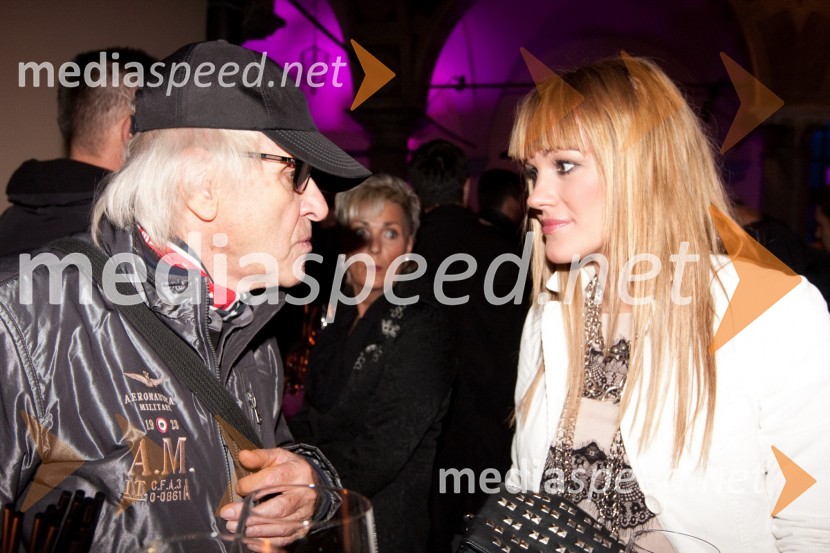 Tone Fornezzi Tof, novinar in Rebeka Dremelj, pevkaPink Si Sloveniji, koncert ob začetku delovanja v Sloveniji