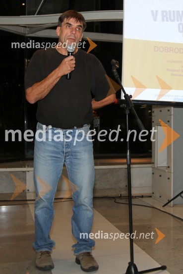 Arne Hodalič, svetovni popotnik, fotograf in urednik fotografije revije National GeograficV rumenem okvirju, dobrodelna dražba