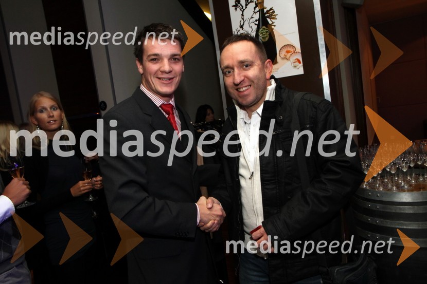 Mitja Šeško, predsednik Rotaract club Maribor in Borut Cvetko, fotografDobrodelna dražba Rotaract cluba Maribor