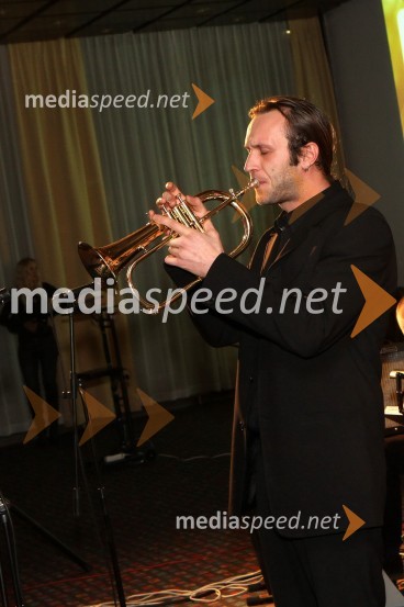 Jernej Senegačnik, dirigent in trobentačDobrodelni Miklavžev koncert Big benda Glasbene šole Gornja Radgona z Otom Pestnerjem