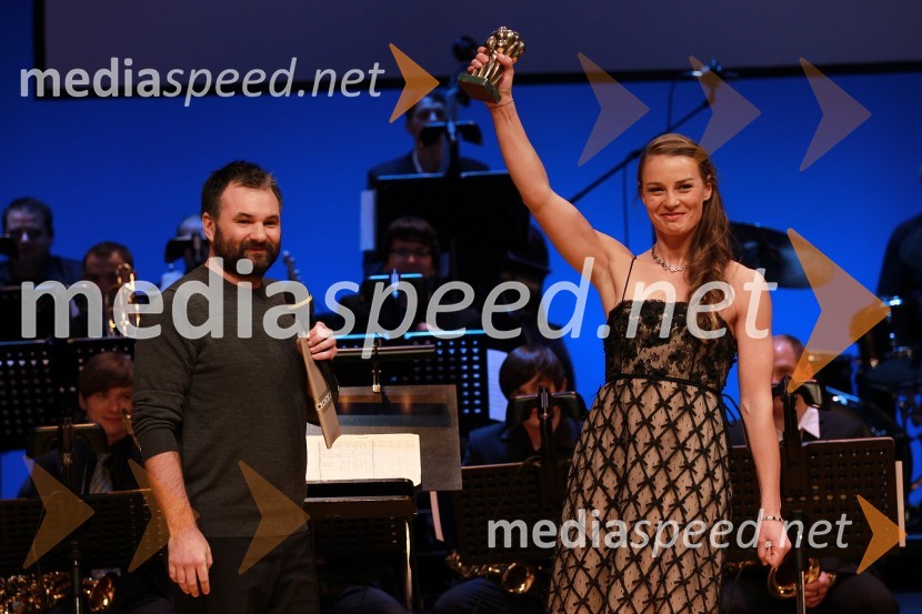 Aleš Smrekar, urednik športnega programa na Radiu Slovenija ter Tina Maze, smučarka in športnica leta 2010Športnika leta 2010 sta Tina Maze in Dejan Zavec