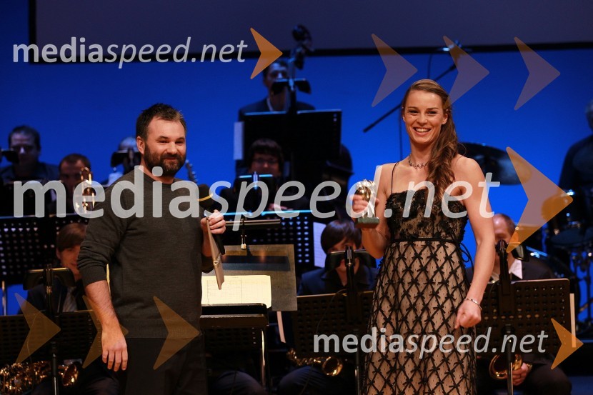 Aleš Smrekar, urednik športnega programa na Radiu Slovenija ter Tina Maze, smučarka in športnica leta 2010Športnika leta 2010 sta Tina Maze in Dejan Zavec