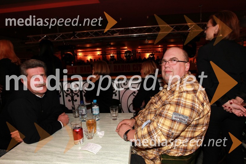 Drago Cotar, predsednik uprave Zavarovalnice Maribor in Danilo Zorko, Zavarovalnica MariborTradicionalni božični koncert Prljavo kazalište