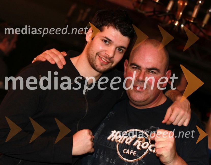 Sašo Ožbolt, košarkar KK Union Olimpija in Matjaž Šalamun - Šalca, član ekipe Reporter MilanTradicionalni božični koncert Prljavo kazalište