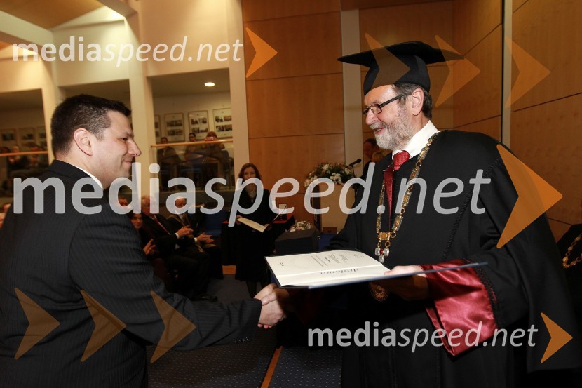 Dr. Marko Hebar, Fakulteta za elektrotehniko, računalništvo in informatiko Univerze v Mariboru in prof. dr. Ivan Rozman, rektor Univerze v MariboruRektorjev dan Univerze v Mariboru 2011, promocija doktorjev znanosti in podelitev nagrad