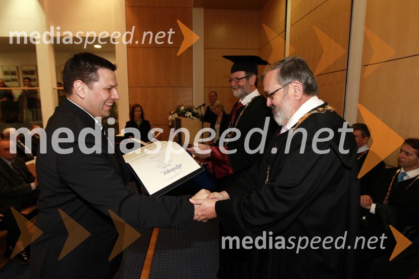 Dr. Marko Hebar, Fakulteta za elektrotehniko, računalništvo in informatiko Univerze v Mariboru in prof. dr. Igor Tičar, dekan Fakultete za elektrotehniko, računalništvo in informatiko Univerze v MariboruRektorjev dan Univerze v Mariboru 2011, promocija doktorjev znanosti in podelitev nagrad