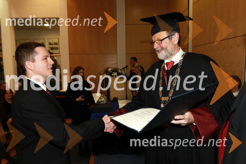 Dr. Marko Jakovac, Fakulteta za naravoslovje in matematiko Univerze v Mariboru in prof. dr. Ivan Rozman, rektor Univerze v Mariboru 
Rektorjev dan Univerze v Mariboru 2011, promocija doktorjev znanosti in podelitev nagrad