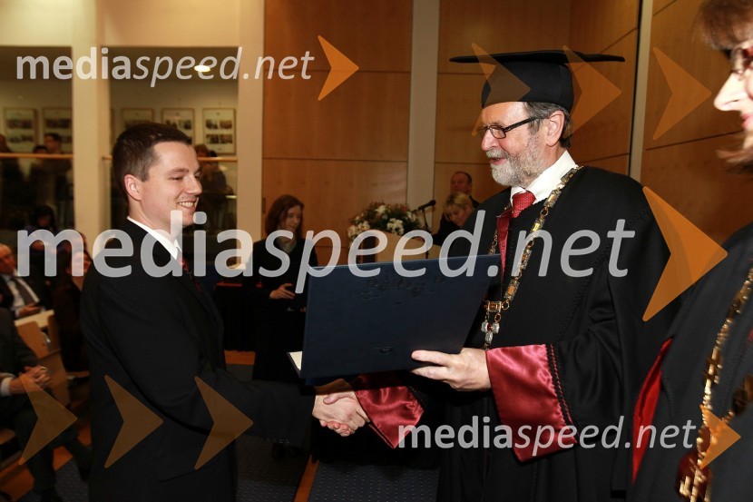 Dr. Marko Jakovac, Fakulteta za naravoslovje in matematiko Univerze v Mariboru in prof. dr. Ivan Rozman, rektor Univerze v Mariboru 
Rektorjev dan Univerze v Mariboru 2011, promocija doktorjev znanosti in podelitev nagrad