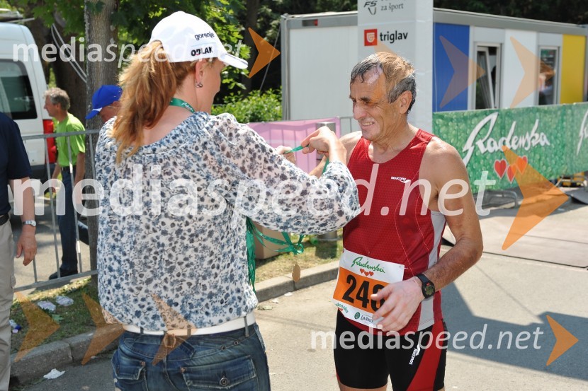 Petra Majdič, smučarska tekačica in Csaba Klam, tek na 42. km31. Maraton treh src, reportaža