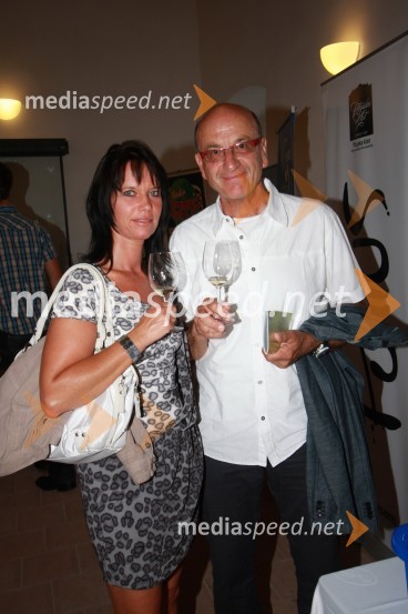 Heinz Slesak, generalni direktor Porsche Slovenija d.o.o. in spremljevalka Silke GuggenbichlerSalon Traminec 2011