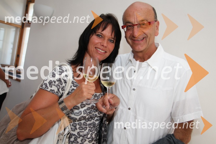 Heinz Slesak, generalni direktor Porsche Slovenija d.o.o. in spremljevalka Silke GuggenbichlerSalon Traminec 2011