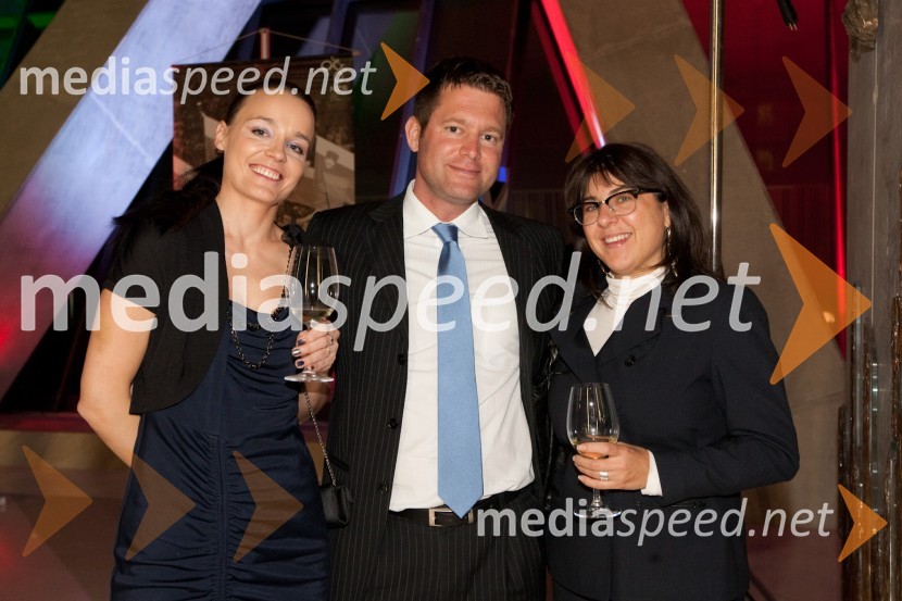 ..., ... in Monika Lapanja, Vodja korporacijskega komuniciranja, Ekonomska fakultetaAMCHAM, nogometno-poslovno srečanje pred tekmo Slovenija: ZDA