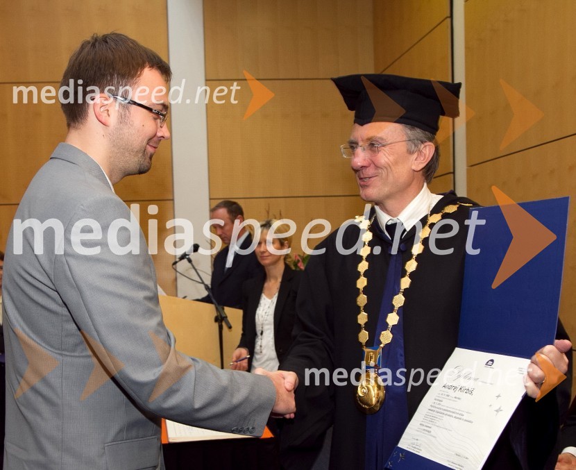 Dr. Andrej Kirbiš, Filozofska fakulteta Univerze v Mariboru in prof. dr. Danijel Rebolj, rektor Univerze v MariboruPromocija doktorjev znanosti Univerze v Mariboru, december 2011