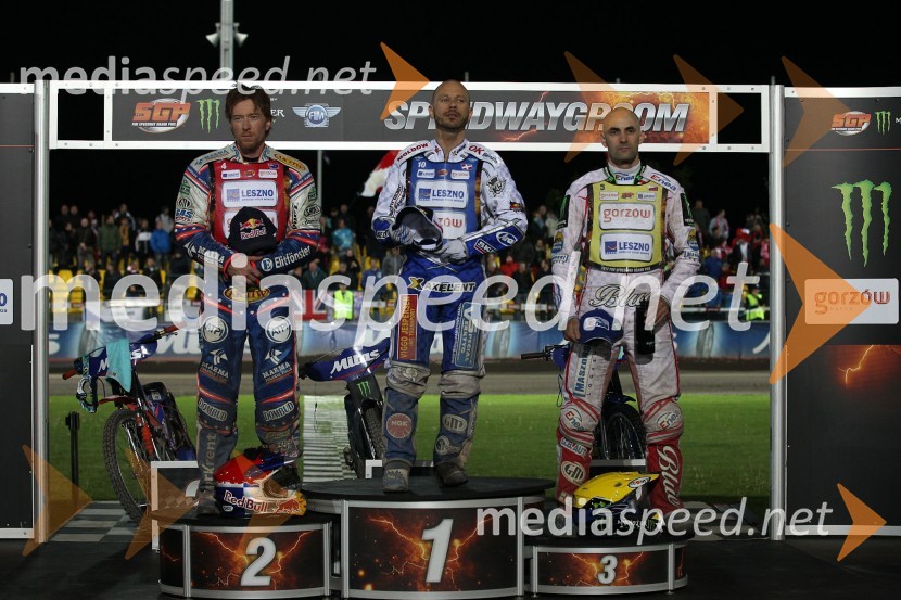 Jason Crump (Avstralija), 2. mesto, Nicki Pedersen (Danska), zmagovalec VN Češke in Tomasz Gollob (Poljska), 3. mestoSpeedway, Grand Prix 2012, VN Češke, dirka