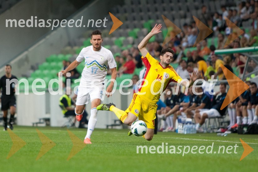Andraž Kirm, nogometaš in Razvan Cocis, nogometašSlovenija – Romunija, nogometna tekma pred začetkom kvalifikacij za SP 2014