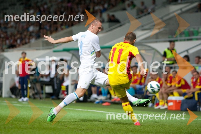 Jasmin Kurtič, nogometaš in Gabriel Torje, nogometašSlovenija – Romunija, nogometna tekma pred začetkom kvalifikacij za SP 2014