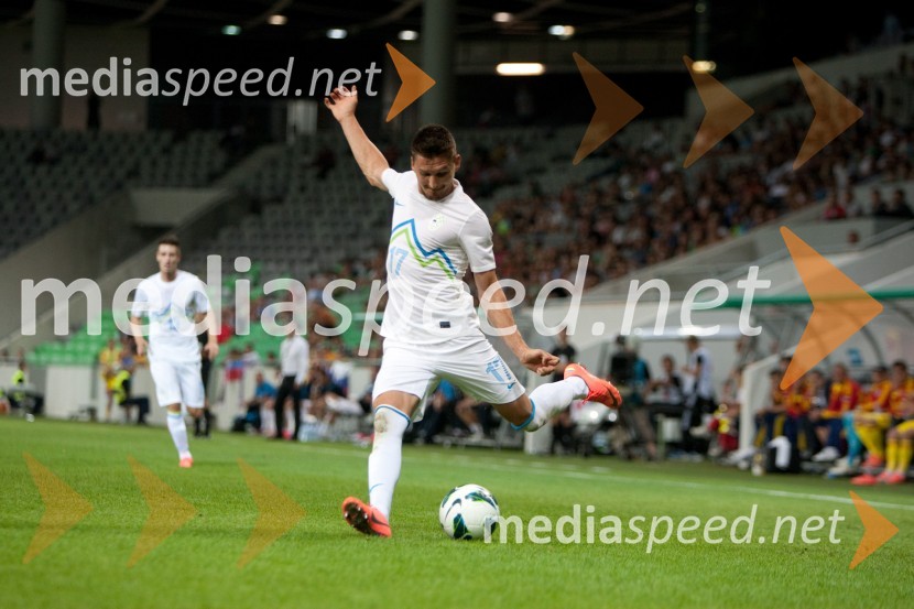 Andraž Kirm, nogometašSlovenija – Romunija, nogometna tekma pred začetkom kvalifikacij za SP 2014