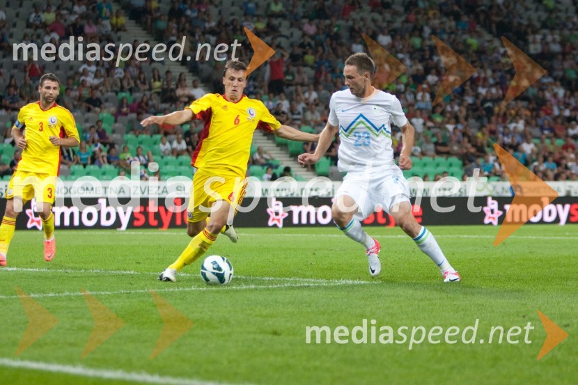 Vlad Chiriches, nogometaš in Tim Matavž, nogometašSlovenija – Romunija, nogometna tekma pred začetkom kvalifikacij za SP 2014