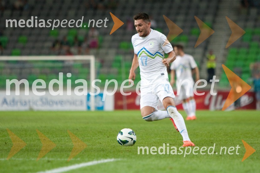 Andraž Kirm, nogometašSlovenija – Romunija, nogometna tekma pred začetkom kvalifikacij za SP 2014