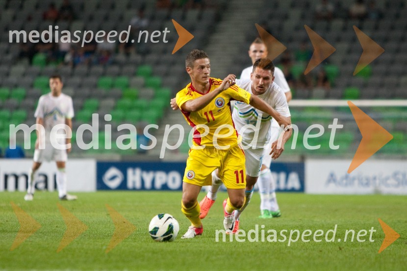 Gabriel Torje, nogometaš in Andraž Kirm, nogometašSlovenija – Romunija, nogometna tekma pred začetkom kvalifikacij za SP 2014