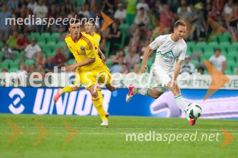 Vlad Chiriches, nogometaš in TIm Matavž, nogometašSlovenija – Romunija, nogometna tekma pred začetkom kvalifikacij za SP 2014