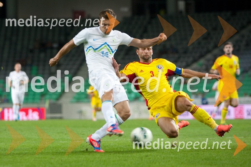 Zlatko Dedič, nogometaš inn Razvan Rat, nogometašSlovenija – Romunija, nogometna tekma pred začetkom kvalifikacij za SP 2014