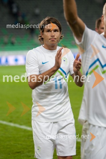 Etien Velikonja, nogometašSlovenija – Romunija, nogometna tekma pred začetkom kvalifikacij za SP 2014