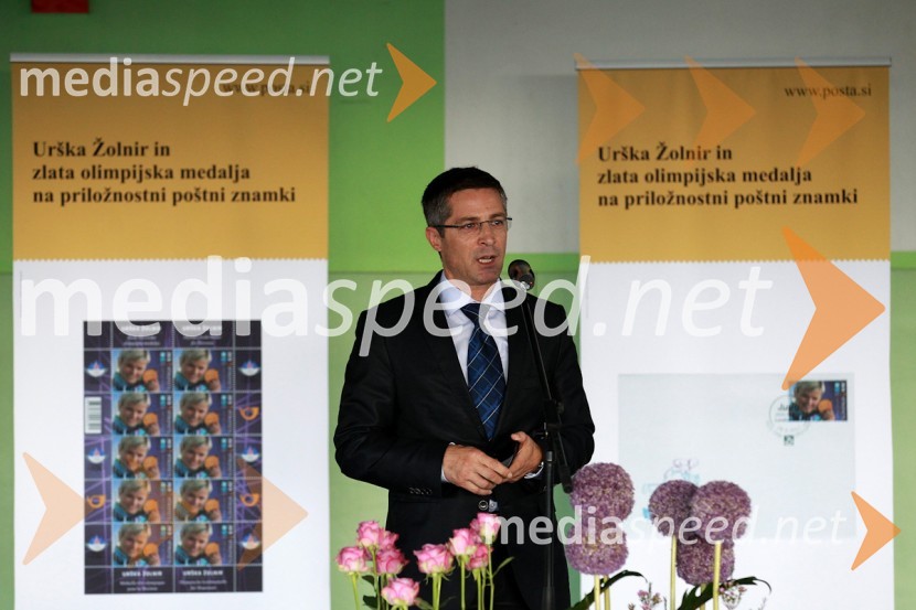 Mag.	Boris Novak, generalni direktor Pošte SlovenijePošta Slovenije, promocija priložnostne znamke Urške Žolnir
