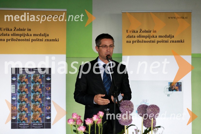 Mag.	Boris Novak, generalni direktor Pošte SlovenijePošta Slovenije, promocija priložnostne znamke Urške Žolnir