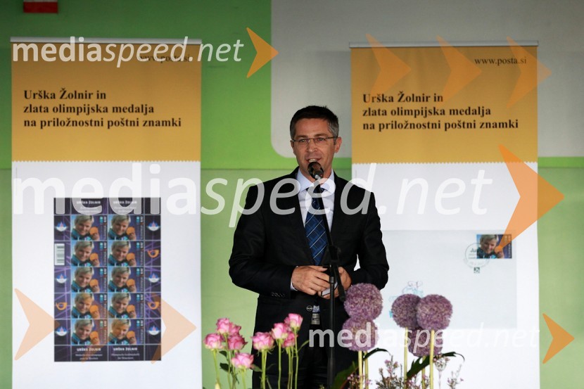 Mag.	Boris Novak, generalni direktor Pošte SlovenijePošta Slovenije, promocija priložnostne znamke Urške Žolnir