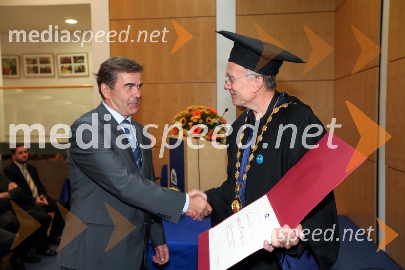 Mag. Rado Ferlič, pomočnik direktorja sektorja za prenosno omrežje ELES Elektro-Slovenija d.o.o. in prof. dr. Danijel Rebolj, rektor Univerze v MariboruUniverza v Mariboru, Rektorjev dan 2012