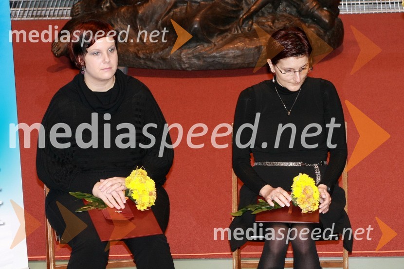 	Nina Berložnik, prevzemnica nagrade Društva srčnih mamic za dobrotnico leta 2012 in Tanja Harej, prejemnica nagrade za Darovalca leta 2012 v imenu podjetja PipistrelLjudje odprtih rok