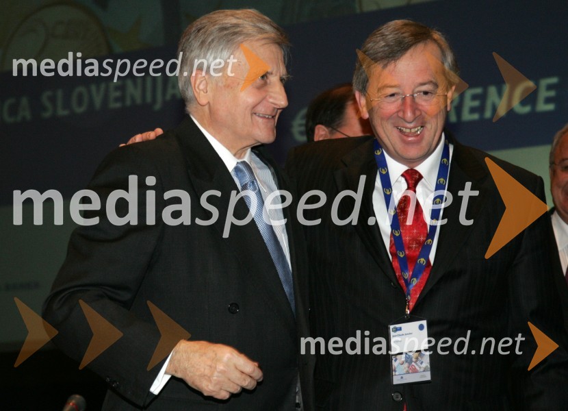 Jean-Claude Trichet, predsednik Evropske Centralne Banke in Jean-Claude Juncker, predsednik Eurogrupa in premier Luxemburga 
 
Evro konferenca ob uvedbi evra v Sloveniji