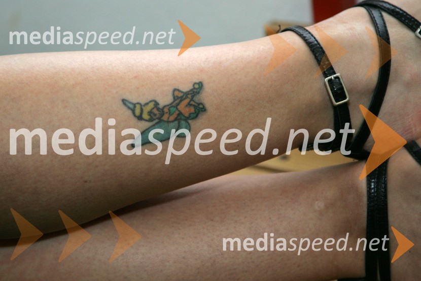 Tatoo, Darije Štravs Tisu, pevka skupine DežurSlovenec leta 2006