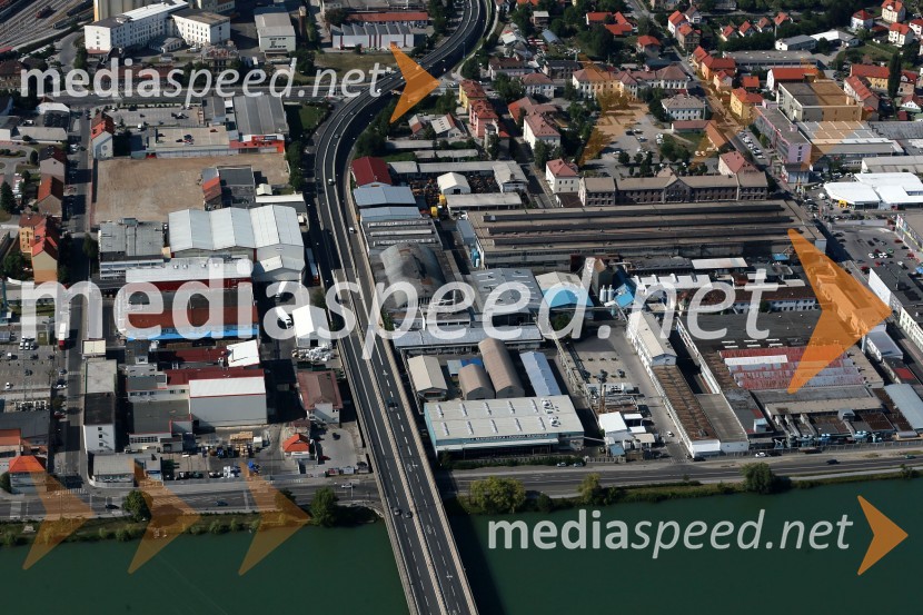 Maribor Melje: Žito Intes d.d., Henkel Slovenija d.o.o., MLM d.d. Mariborska livarna Maribor, Košaki Tovarna mesnih izdelkov d.d., Oreško nabrežje, reka Drava, železniški most, dvoetažni most&nbsp;Maribor in okolica iz zraka